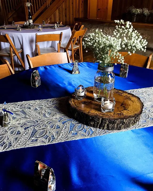blue-themed table setting with white daises