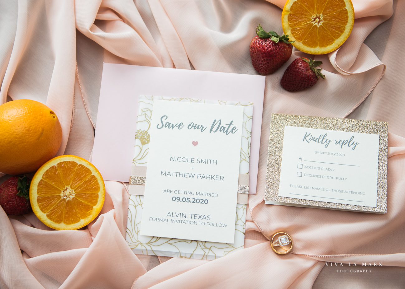 Wedding invitation, rings, strawberries, and, oranges
